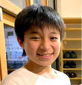 He is 14 years old. Rinatro likes music, games, table tennis, and badminton. He is interested in visiting different places and meeting new friends. He would like to visit the beautiful nature in Utah.