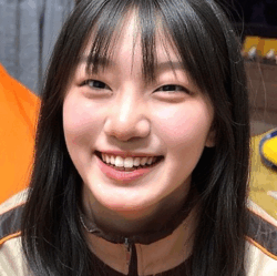 Riko is 16 years old. She enjoys reading, hiking, animals, camping, video games, tv, cooking, arts & crafts and more! She is cheerful, tidy, honest, flexible, and sociable. She wrote in English "I love staying active!! At school, I enjoy carious sports like volleyball and swimming. I am really looking forward to playing sports and being active with my host family. I am also passionate about music. I play the guitar and sing in a band at school. In my free time, I love watching Japanese anime, so I would love to talk about our favorite shows and music. I am very interested in food and can't wait to try authentic American home cooking. Since I also love animals and nature, I am fascinated by the beautiful environment in Utah. I hope we can talk about the local wildlife and nature together. I love talking to people and want to communicate a lot with everyone! My primary goal is to improve my English and build genuine connections with my host family and friends in the U.S. through heartfelt conversations. ... I can't wait to join them for activities like camping and sports... To share my own culture, I'd love to cook Japanese dishes like Okonomiyaki or Temaki-zushi for everyone..."